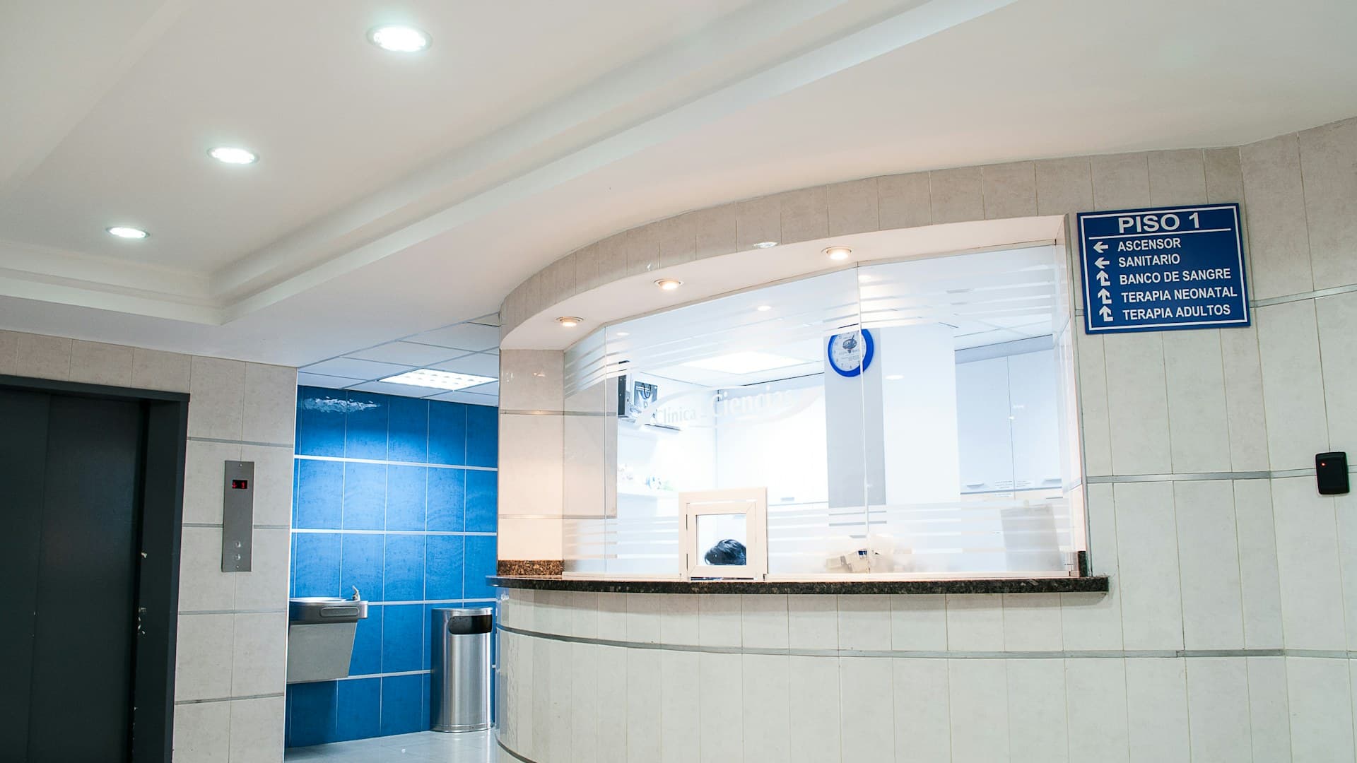Hospital reception scene representing automated patient intake